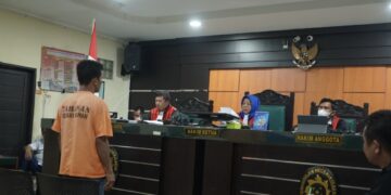 Amir Simatupang saat mendengarkan vonis terhadap dirinya di Pengadilan Negeri Asahan atas kasus perdagangan sisik tenggiling seberat 1,18 Ton. (Foto: Istimewa)